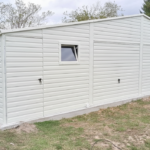 Plechová garáž 11,5×5 m – bílá/trojgaráž "BARTOLOMEJ"